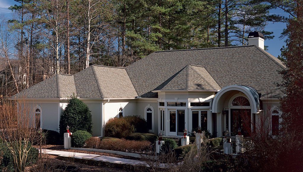 Multi-plane residential roof with valleys and exposed roof edges