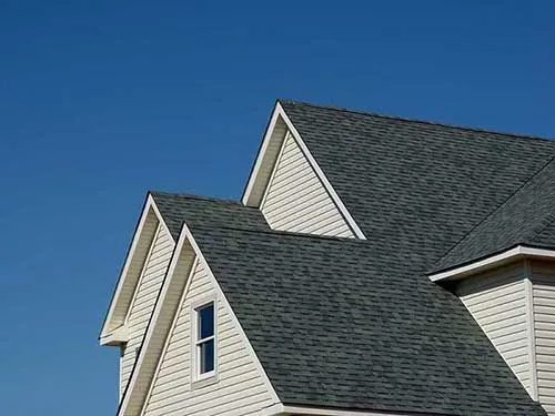 Shingle coverage and roof intersections on a residential roof